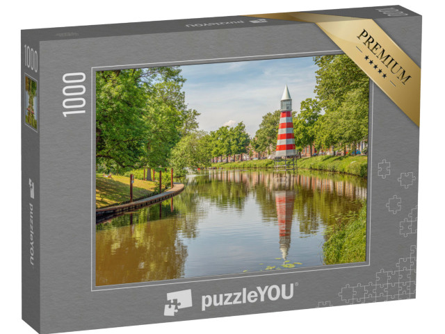 Puzzel 1000 stukjes „Stadsgezicht van Breda, een vuurtoren op de achtergrond“