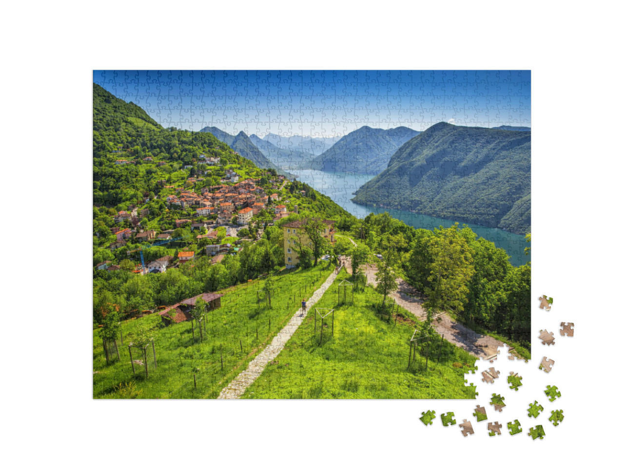 Puzzel 1000 stukjes „Uitzicht op de stad Lugano en het Luganomeer“