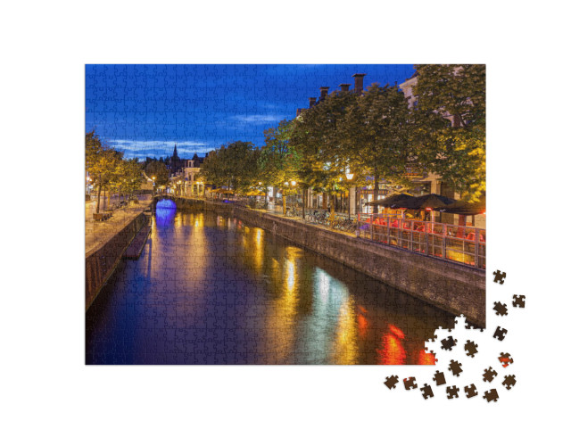Puzzel 1000 stukjes „Grachten door de prachtige stad Leeuwarden, hoofdstad van Friesland“