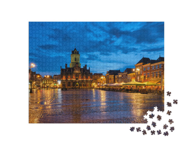 Puzzel 1000 stukjes „Het stadhuis van Delft en de Delftse Markt in de avond“