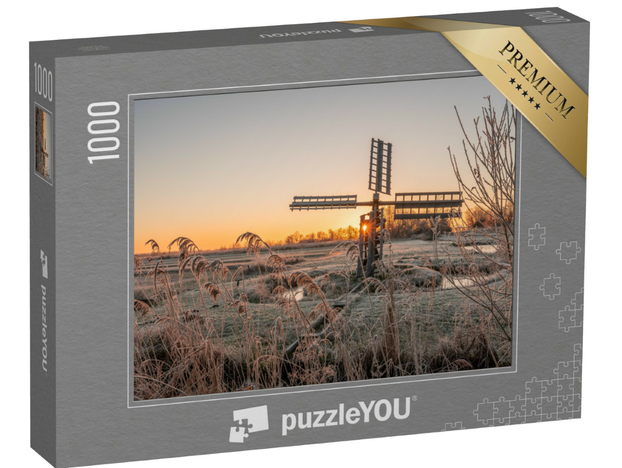 Puzzel 1000 stukjes „Bevroren riet- en grasveld met een oude poldermolen bij zonsopgang, Kalenberg“