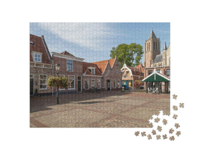 Puzzel 1000 stukjes „Middeleeuwse Onze-Lieve-Vrouwekerk in het centrum van de stad Tholen in de provincie Zeeland“