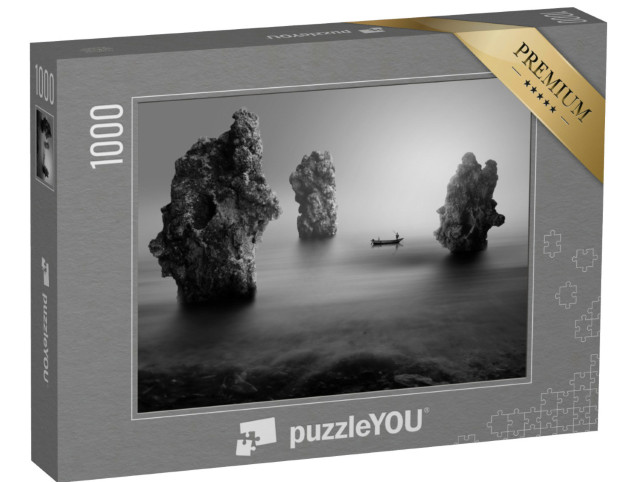 Puzzel 1000 stukjes „Eenzame visser tussen zee rotsen“