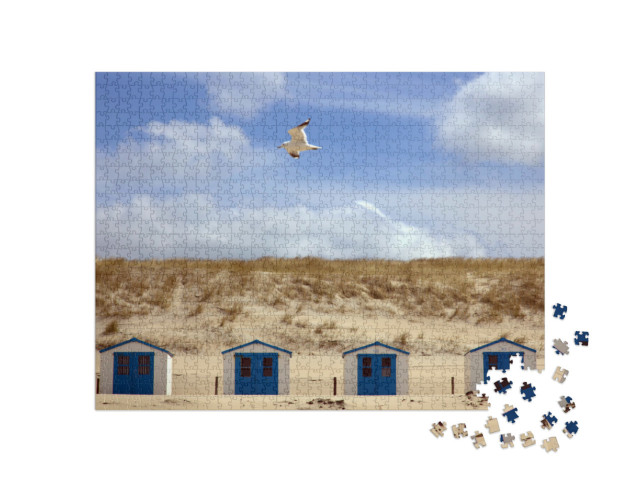 Puzzel 1000 stukjes „Huizen op het strand met blauwe lucht“